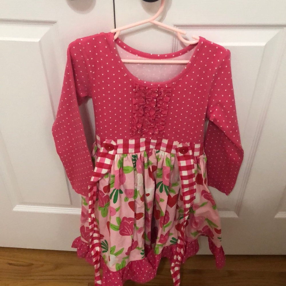 EleanorRose dress size 6-7. Never worn or washed